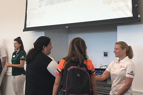 UGR staff presenting during Admissions event.